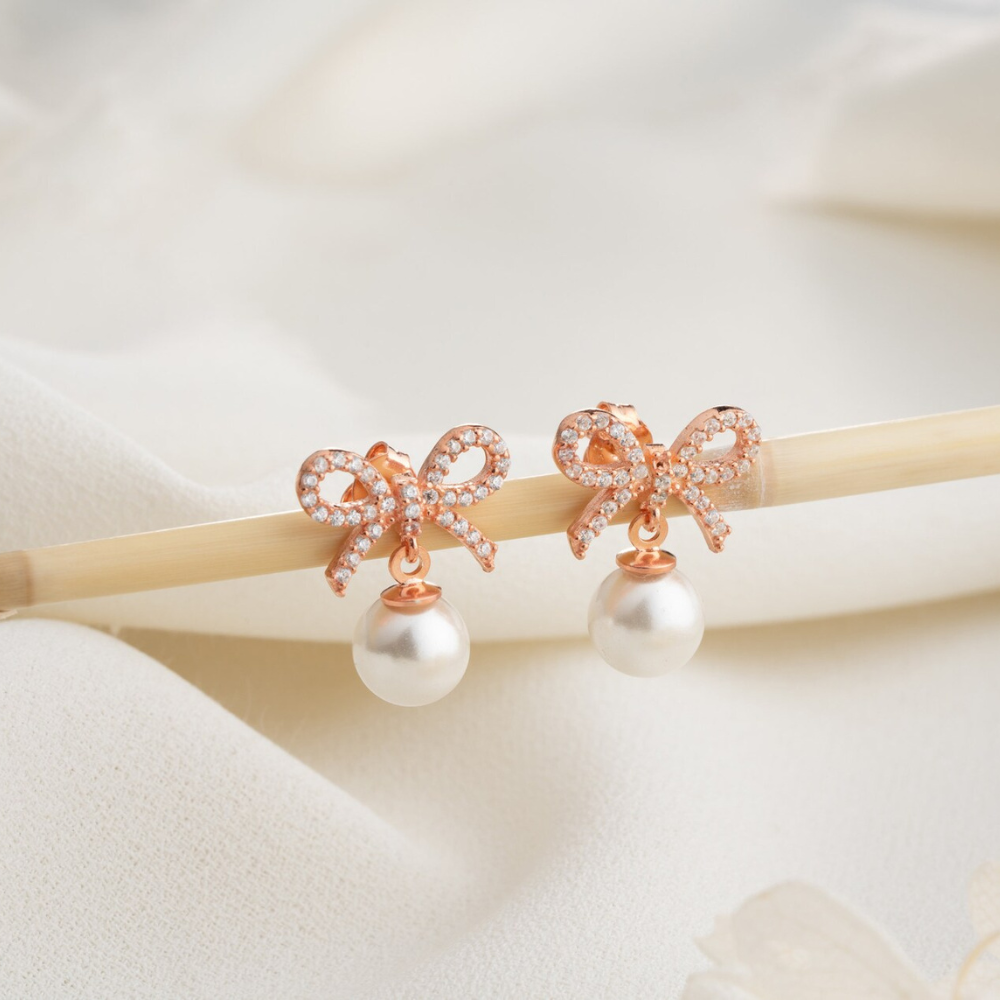 Goldene Schleifen-Perlenohrringe - Bow Pearl Dangle Ohrring