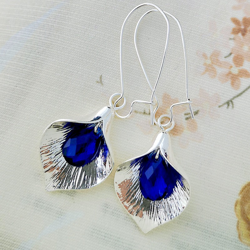 Kreselle – Blaue Lotus-Ohrringe in Silber