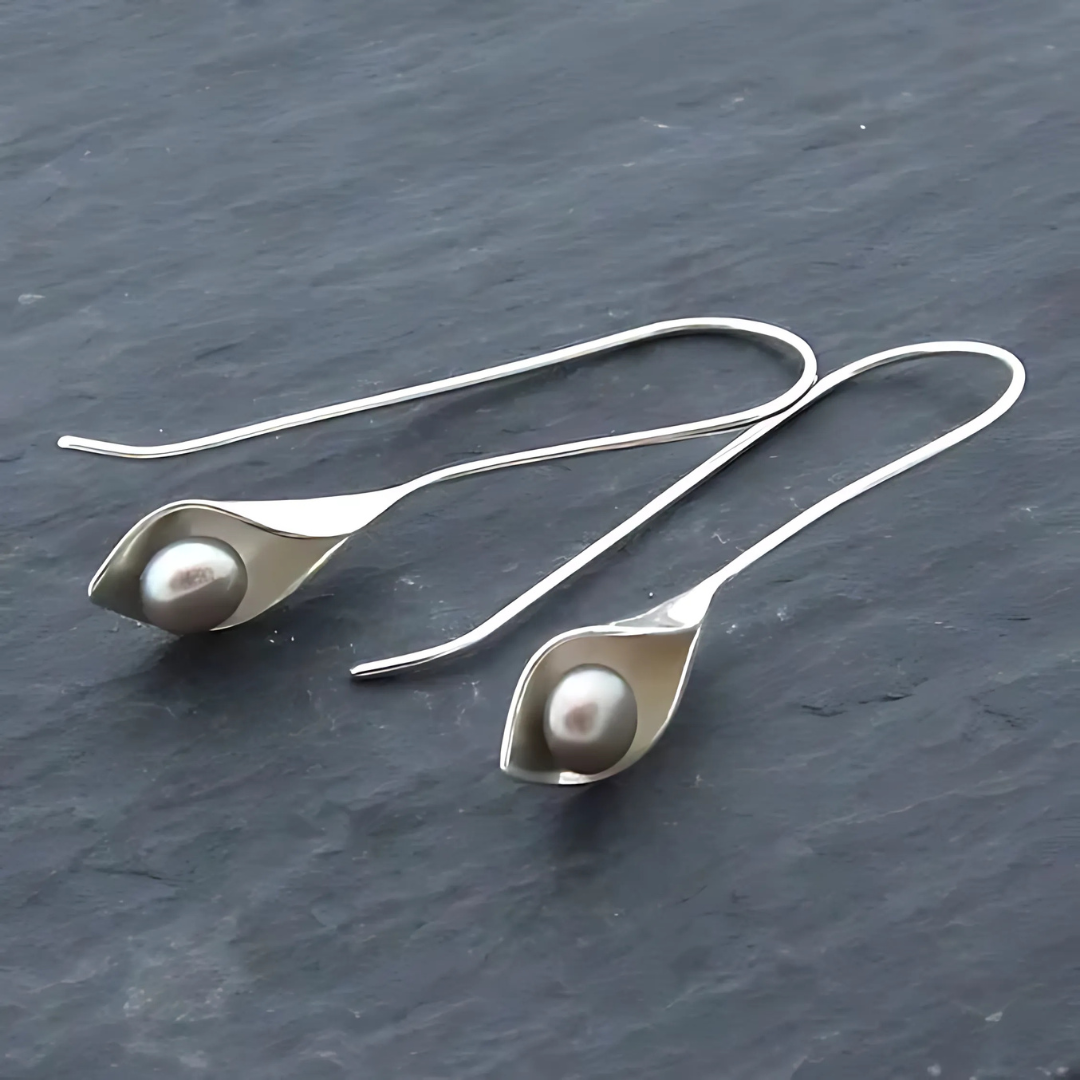 Orielle – Vintage-Ohrringe mit Perlenbewegung