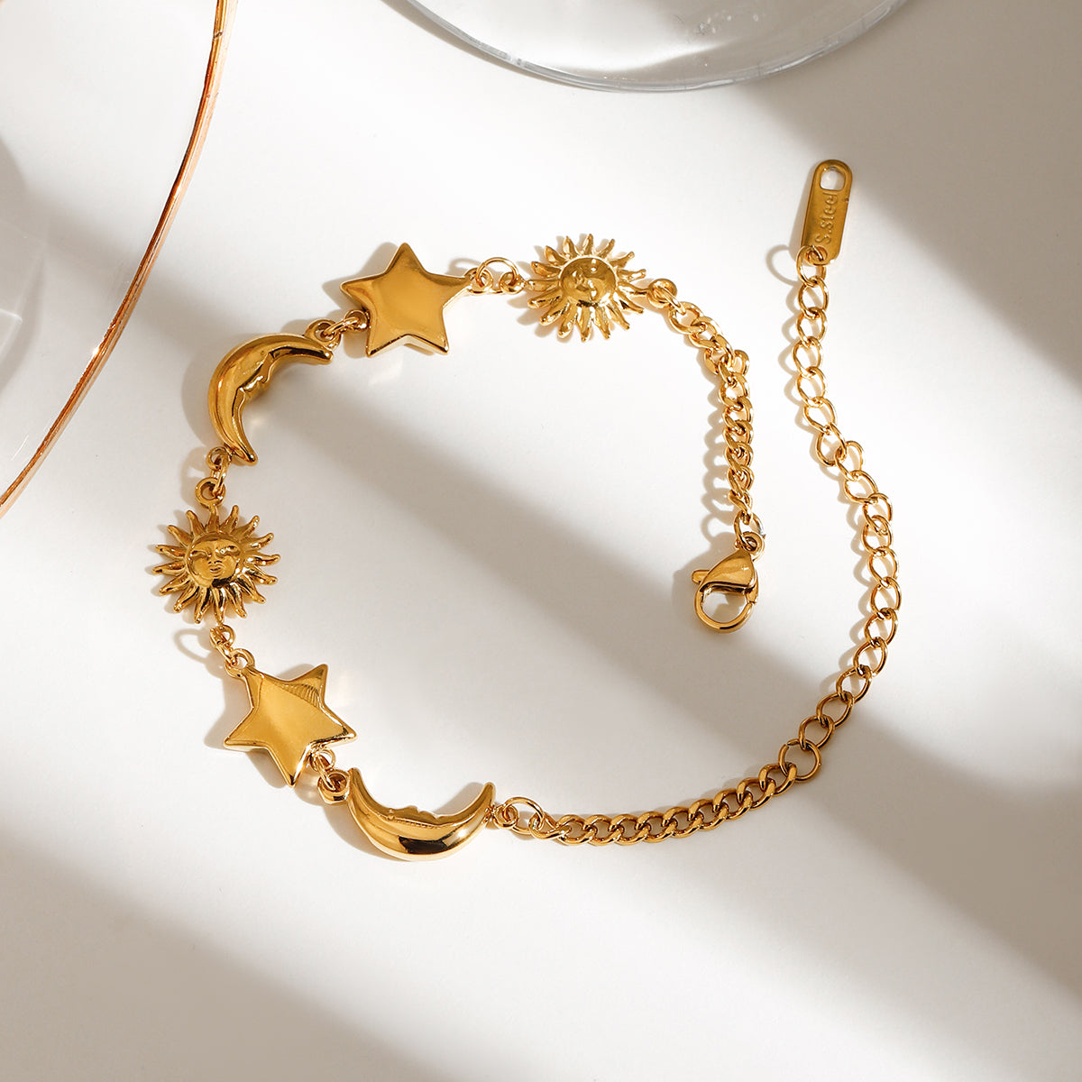 Celina – Armband Anhänger Stern, Mond und Sonne Gold