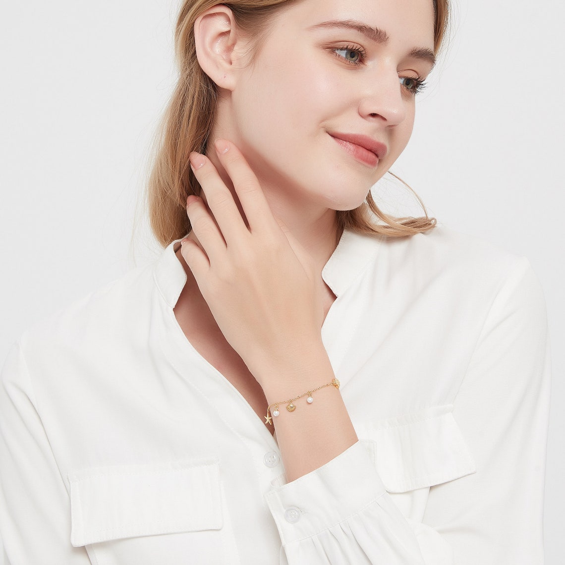 Muschel-Seestern-Charm-Armband