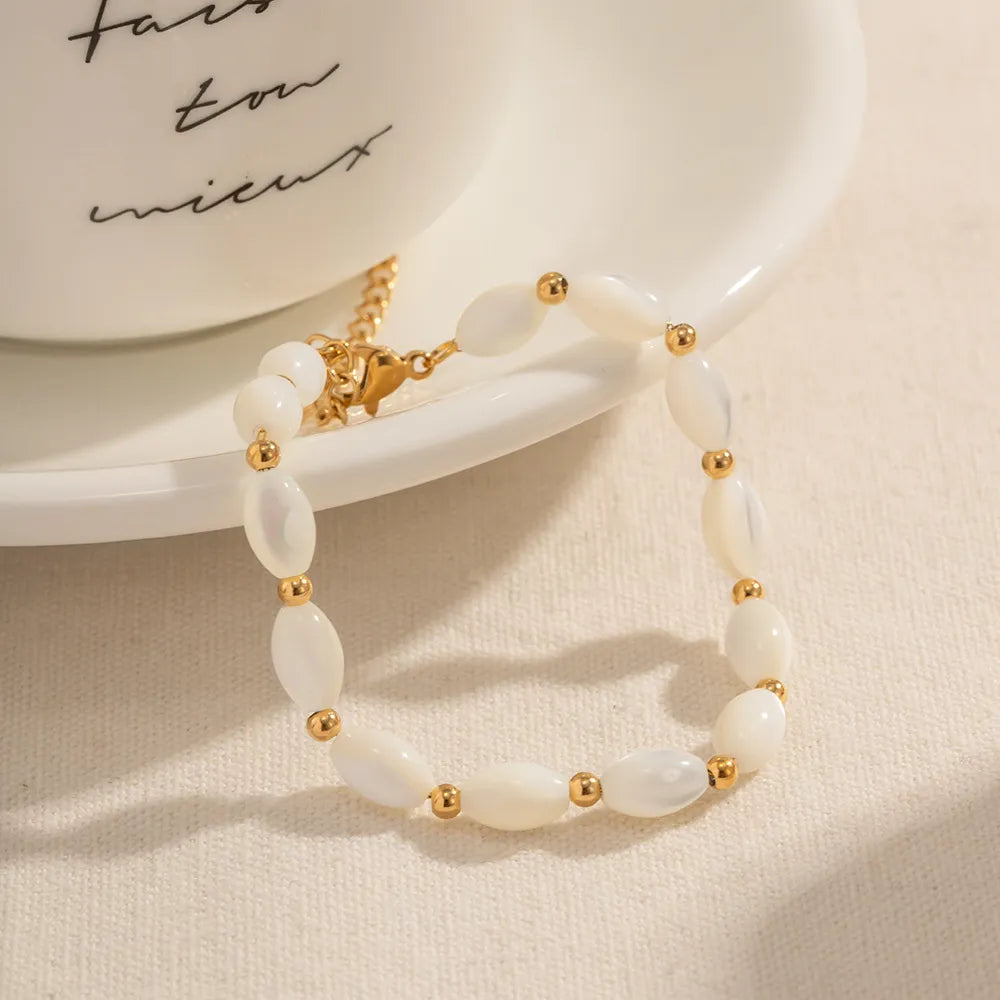 Clara – Ovales Armband aus goldfarbenem Edelstahl