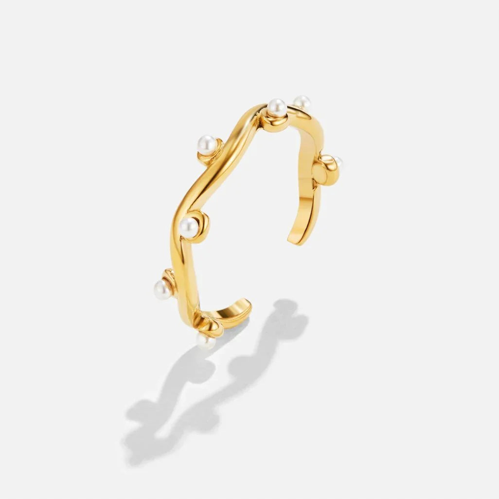 Wilma – Bague in Gold mit Perle und Wellen-Design