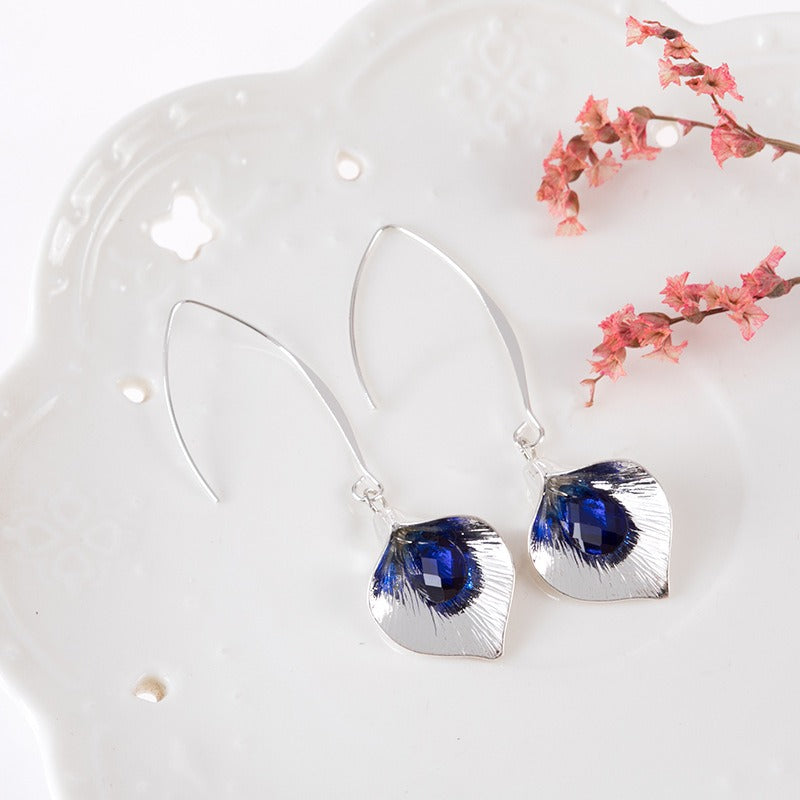 Kreselle – Blaue Lotus-Ohrringe in Silber