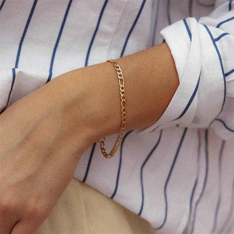 Saturn - Goldfarbenes Kettenarmband