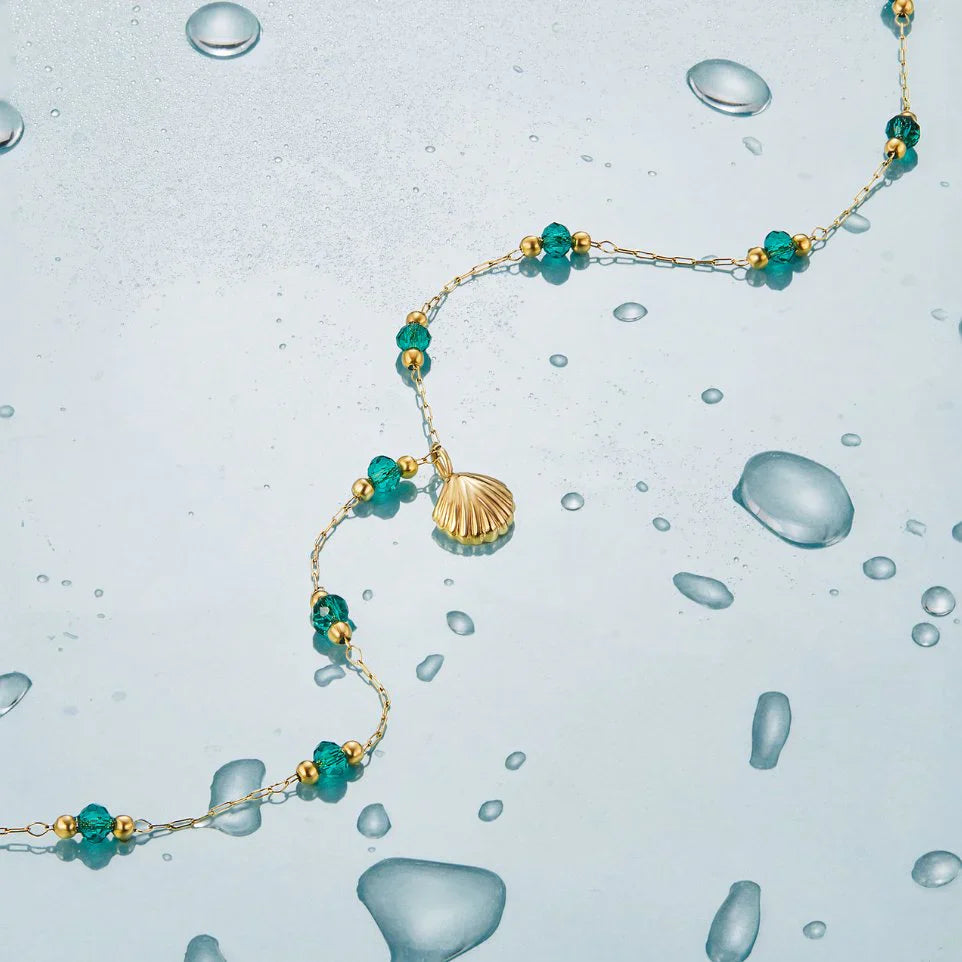 Nea – Goldene Muschel Halskette