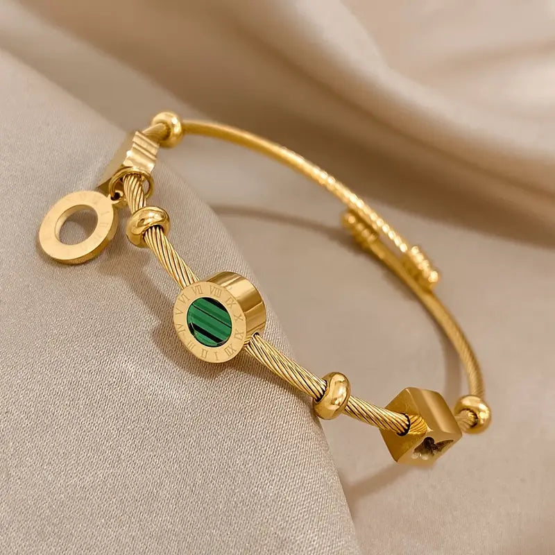 Rhian – Armband Gold Signatur