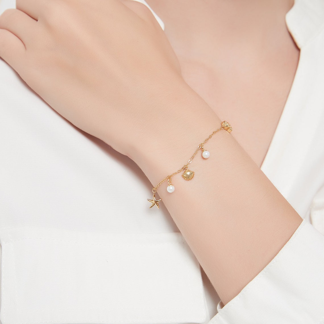 Muschel-Seestern-Charm-Armband